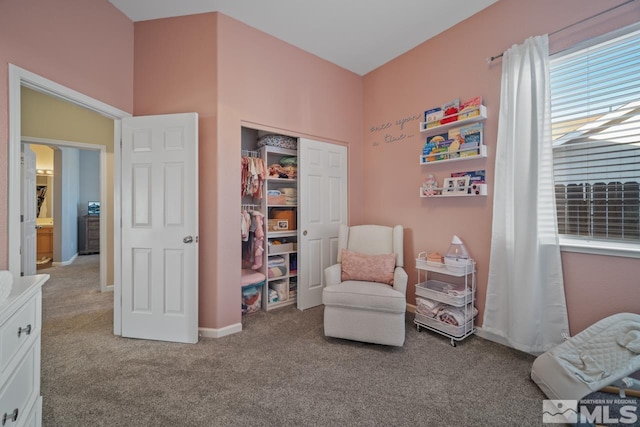 sitting room with light colored carpet