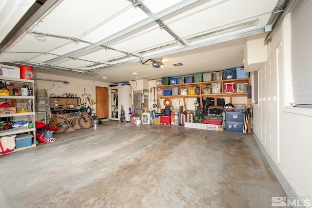 garage featuring a garage door opener