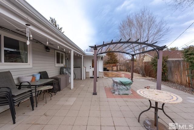 view of patio featuring a pergola