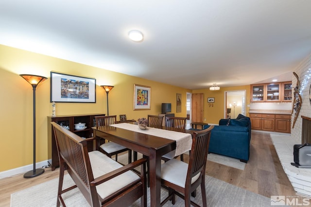 dining room with light wood-type flooring