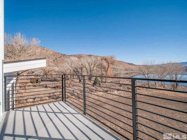 balcony featuring a mountain view