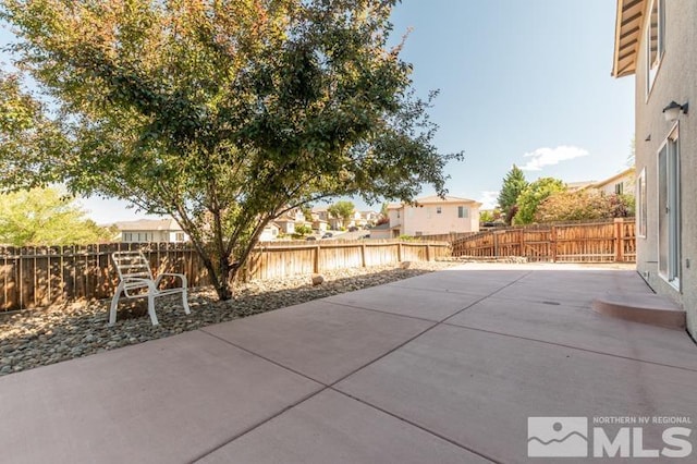 view of patio / terrace featuring a water view