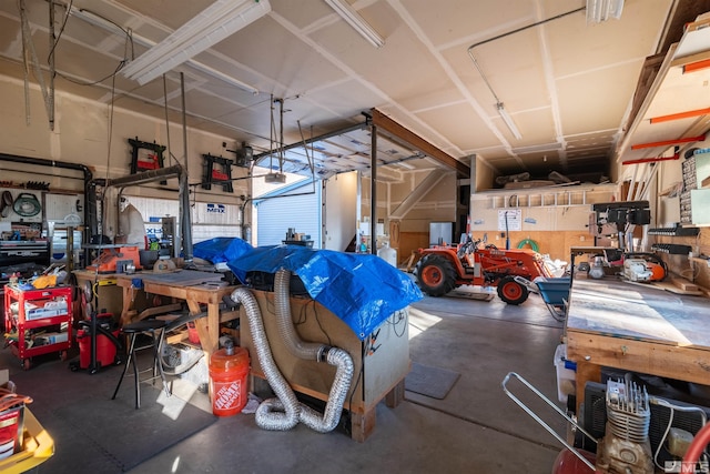 garage with a workshop area