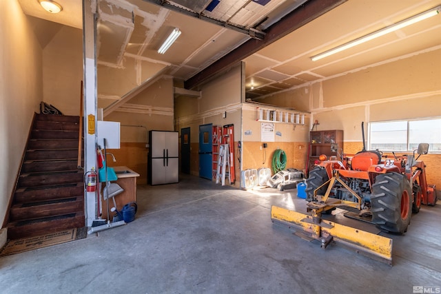 garage with fridge