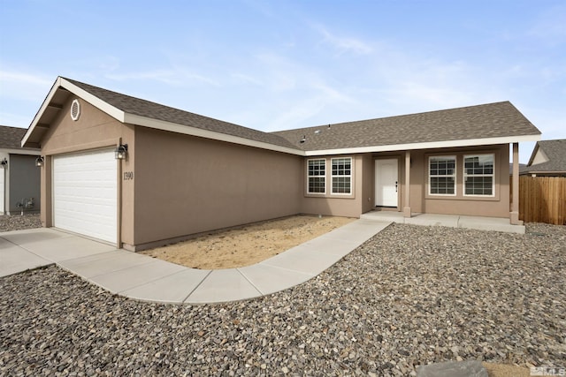 ranch-style home with a garage