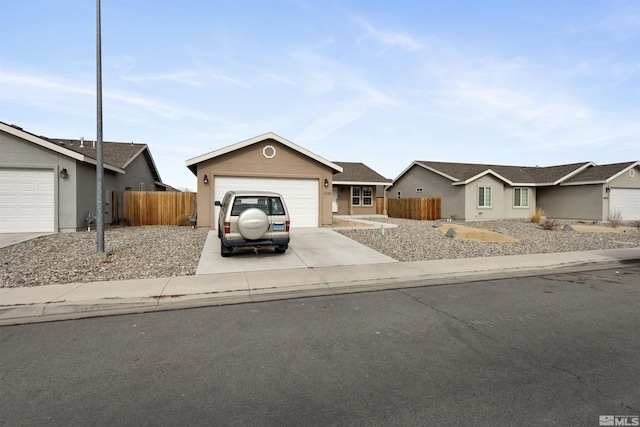 single story home featuring a garage