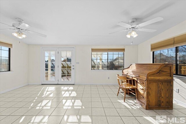 office with ceiling fan and light tile patterned flooring
