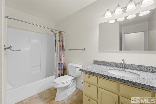 full bathroom with tile patterned floors, vanity, toilet, and shower / tub combo
