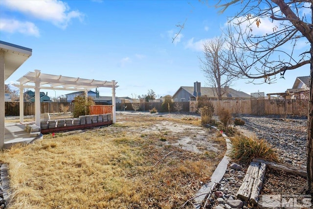 view of yard with a pergola