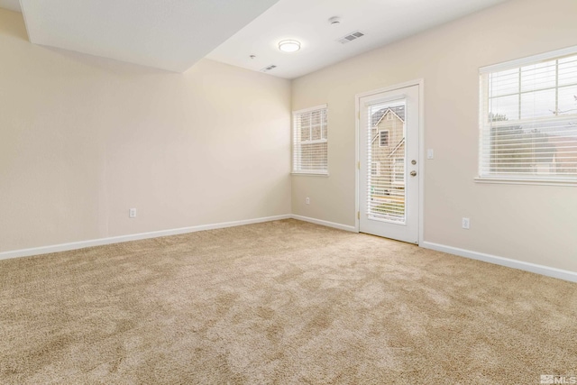 view of carpeted spare room