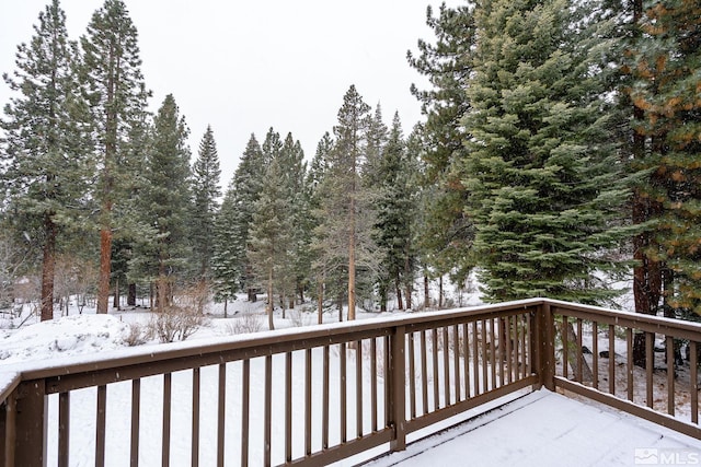 view of snow covered deck