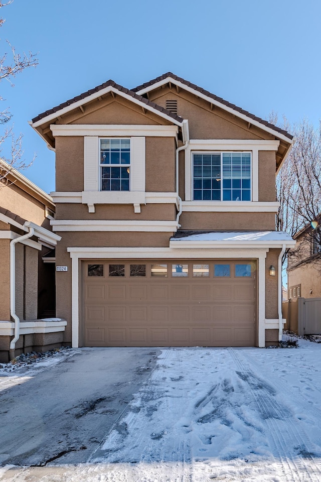 view of front of property featuring a garage