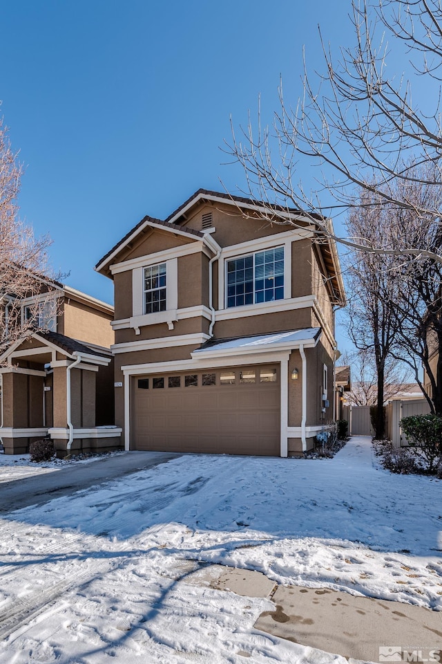 view of front of house with a garage