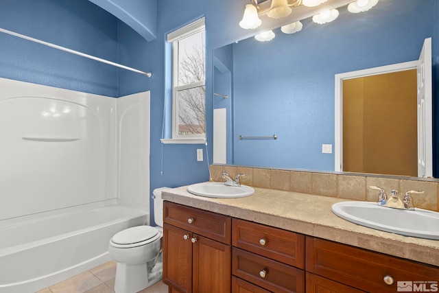 full bathroom with vanity, shower / bathing tub combination, tile patterned floors, and toilet