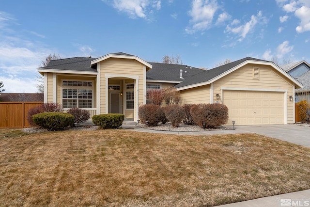 single story home featuring a garage and a front yard