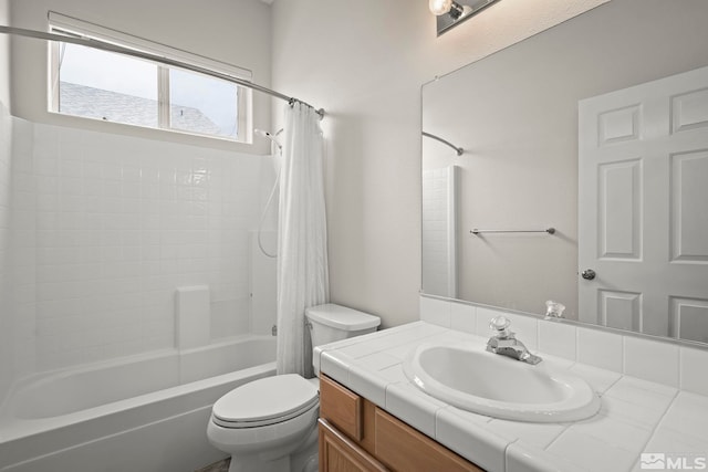 full bathroom with shower / tub combo, vanity, and toilet