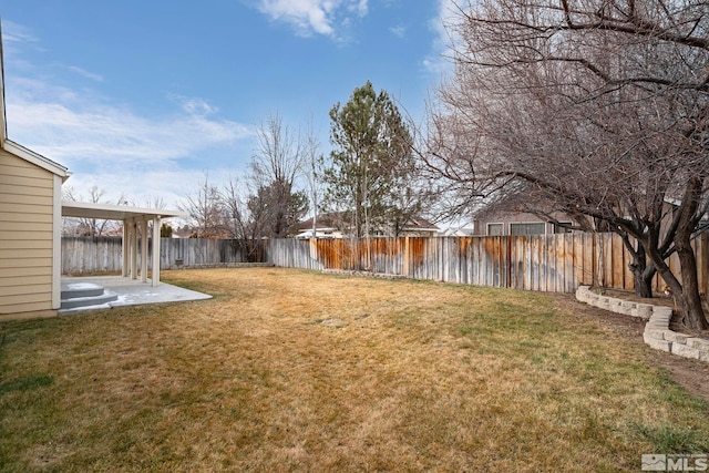 view of yard with a patio area