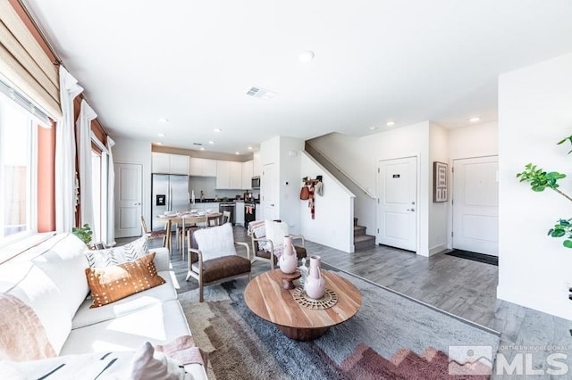 living room with hardwood / wood-style flooring