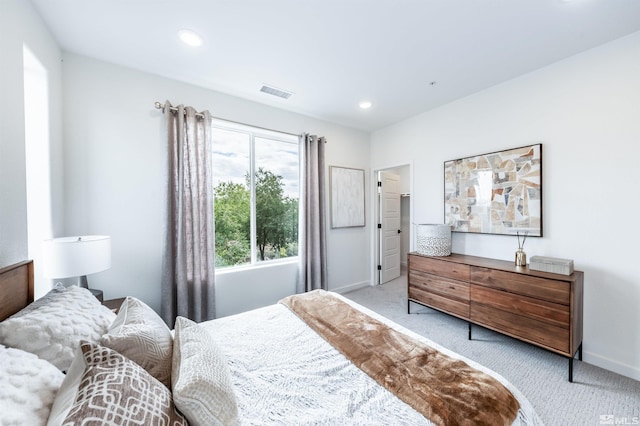 bedroom with light carpet