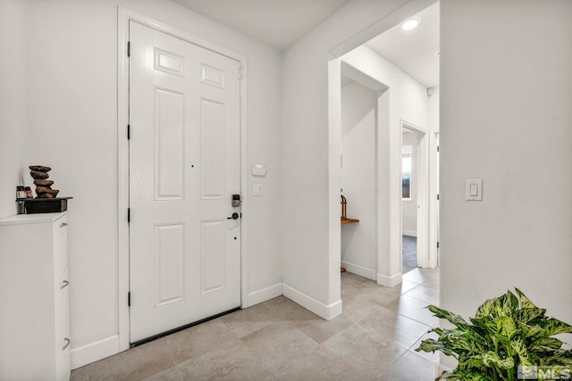 view of tiled foyer entrance