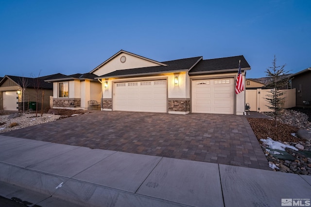 single story home featuring a garage