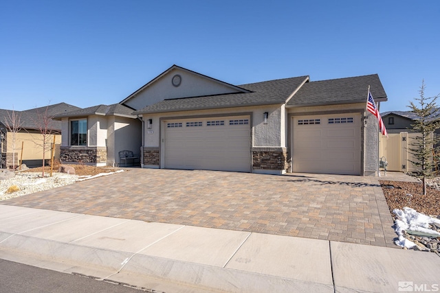 single story home featuring a garage