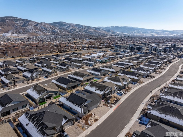 drone / aerial view featuring a mountain view