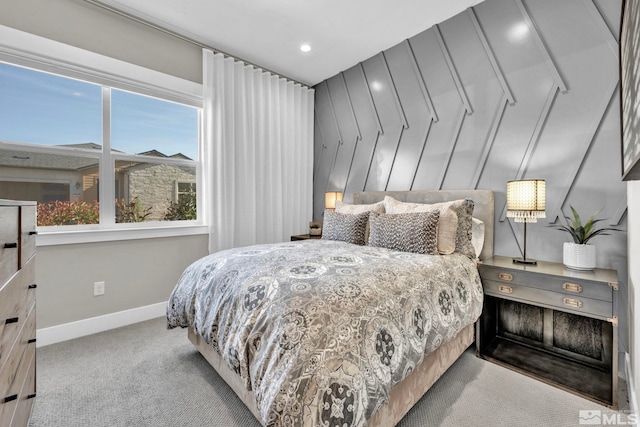 bedroom featuring light carpet