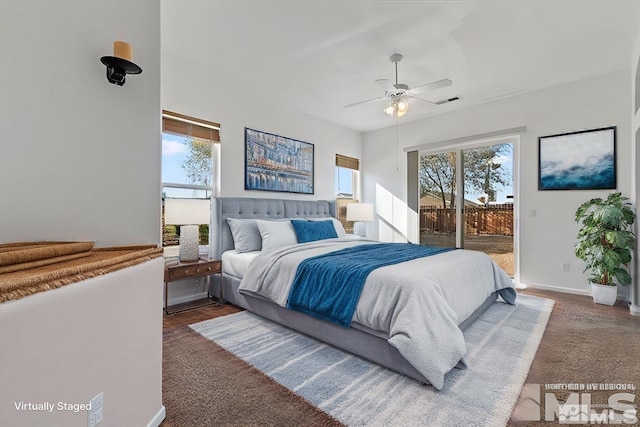 bedroom with access to outside and ceiling fan