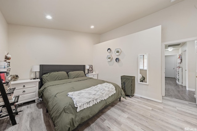 bedroom with light wood-type flooring