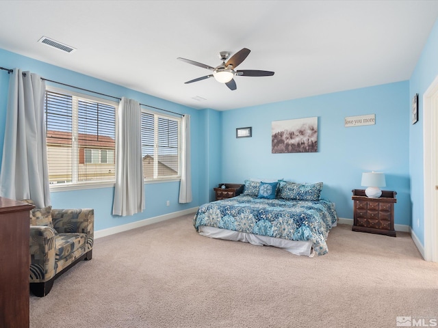 bedroom featuring ceiling fan and carpet flooring