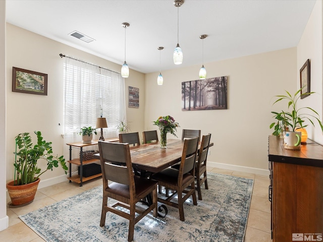 view of tiled dining space