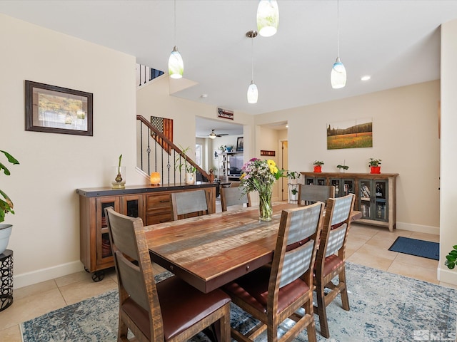 dining room with light tile patterned flooring