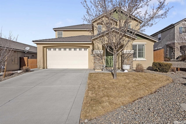 view of front of property with a garage