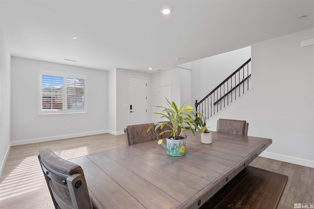 dining area with light wood-type flooring