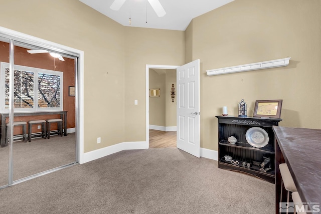 bedroom with ceiling fan and carpet