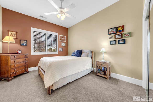 carpeted bedroom featuring ceiling fan