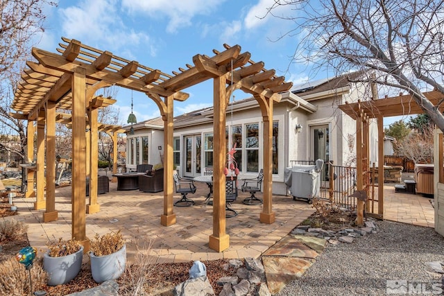 view of patio / terrace featuring an outdoor hangout area and a pergola