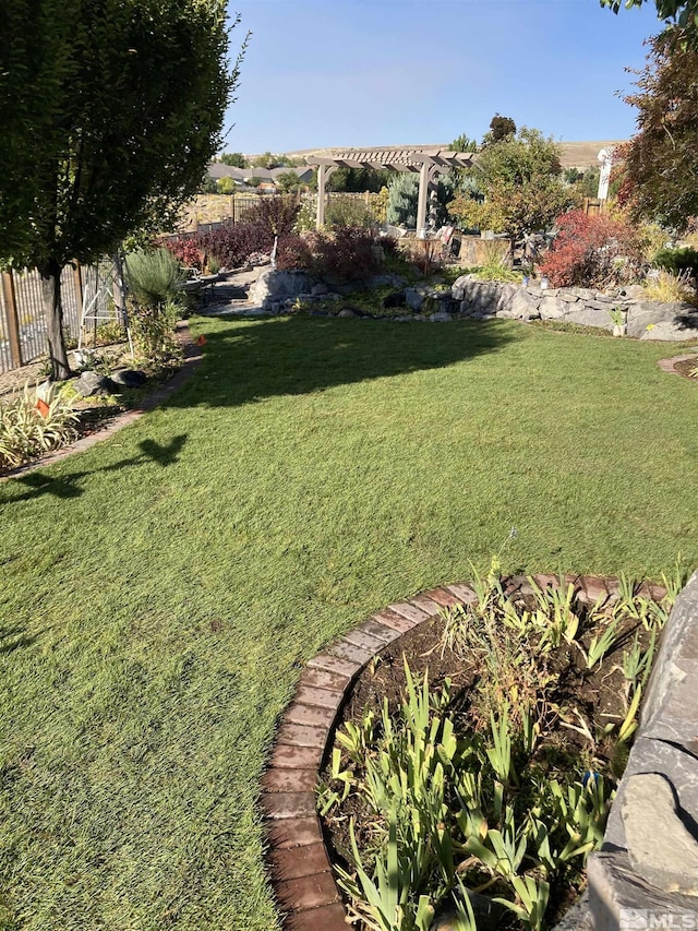 view of yard with a pergola