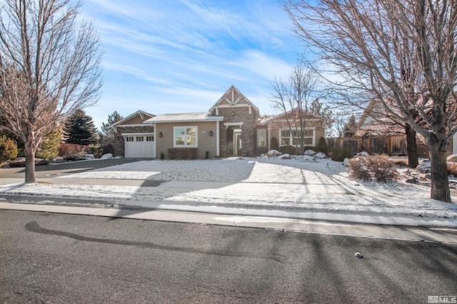 single story home featuring a garage