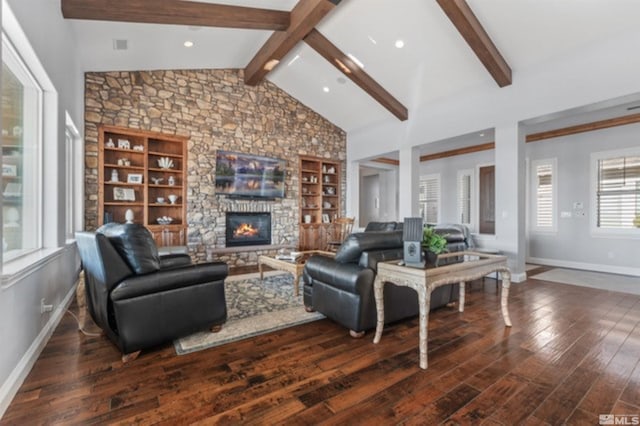 living room featuring dark wood-type flooring, a fireplace, built in features, and vaulted ceiling with beams