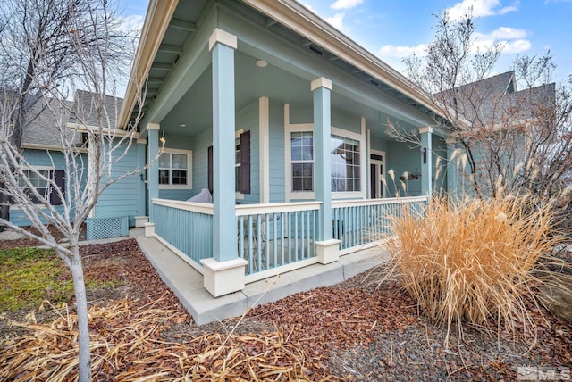 view of home's exterior with covered porch