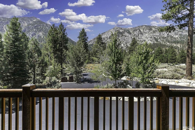 wooden terrace with a mountain view