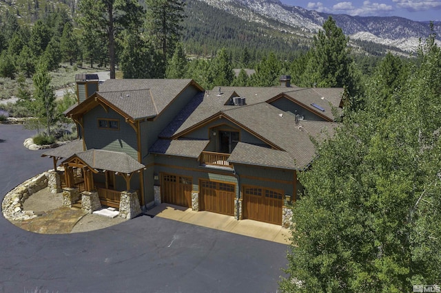 view of front of home featuring a mountain view