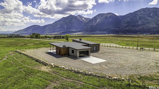 view of mountain feature with a rural view