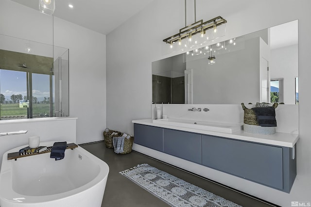 bathroom with vanity, shower with separate bathtub, and concrete floors