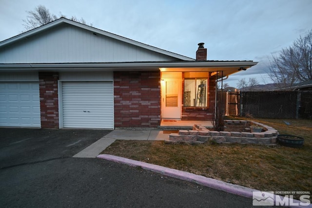 view of front of home featuring a garage