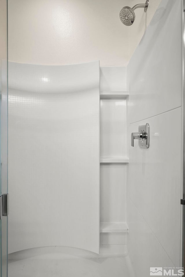 bathroom featuring a shower