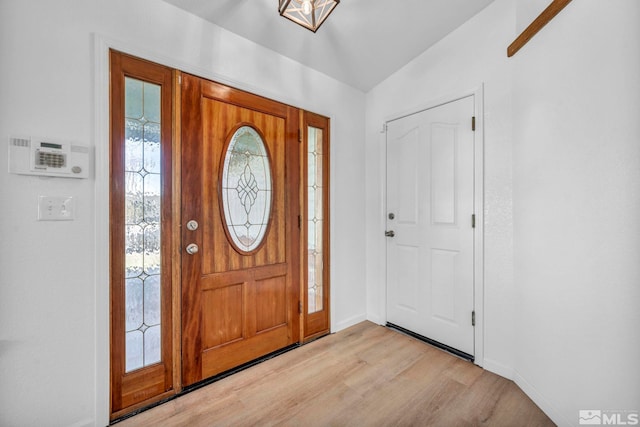 foyer with light wood-type flooring