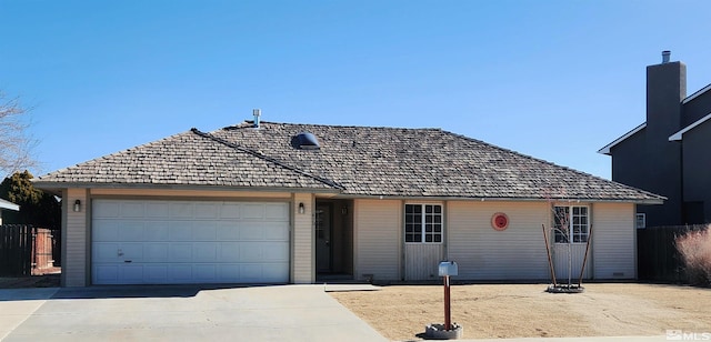 ranch-style house with a garage